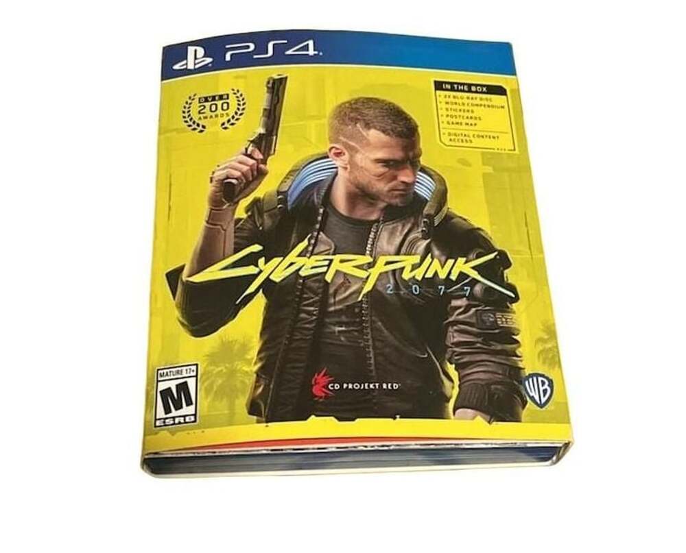 Cyberpunk 2077 PlayStation 4 Game Complete with Discs and Extras